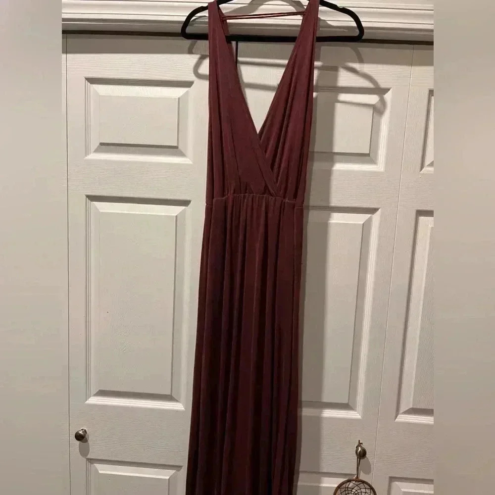 Wine colour dress MIDI  length low cut with elastic at waist. Never worn.